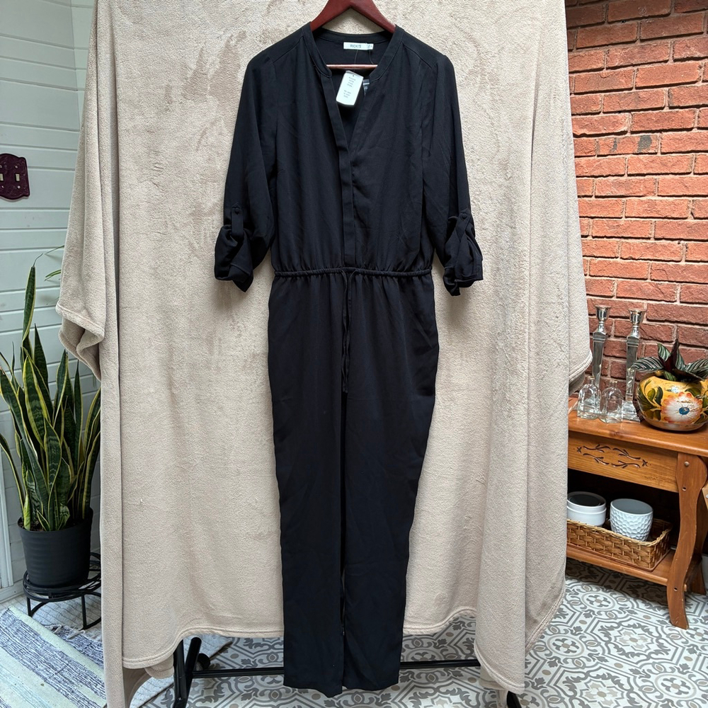 Ricki's Black Long Sleeve Jumpsuit Size 8 Timeless Elevated Casual
